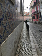 Narrow road and walkway with tiles